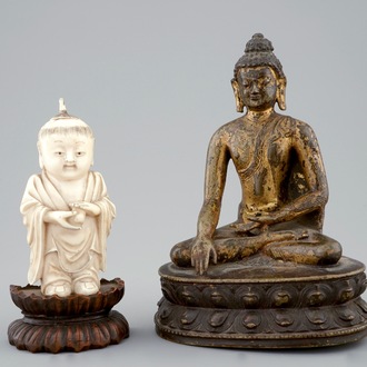 A Chinese gilt bronze Buddha and an ivory figure of a boy, 19th C.